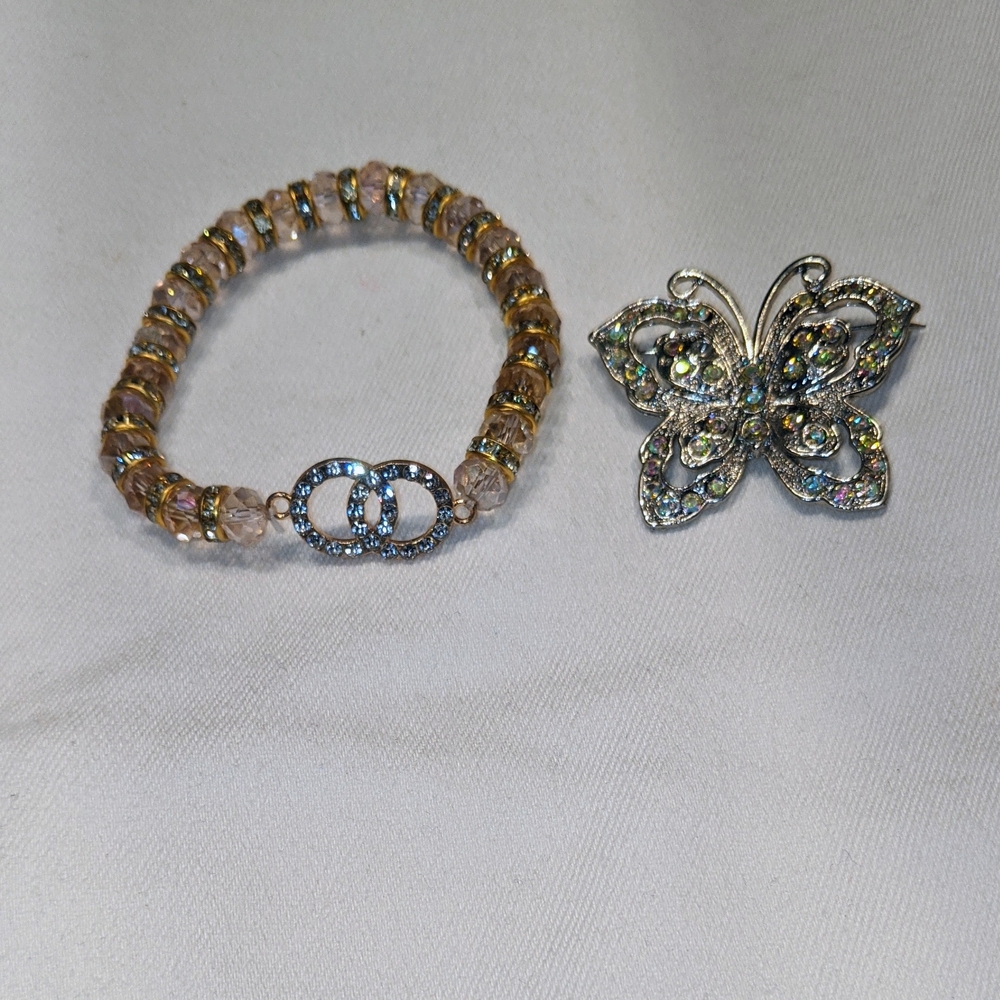 Elegant Gold and Silver Bracelet with Butterfly Brooch